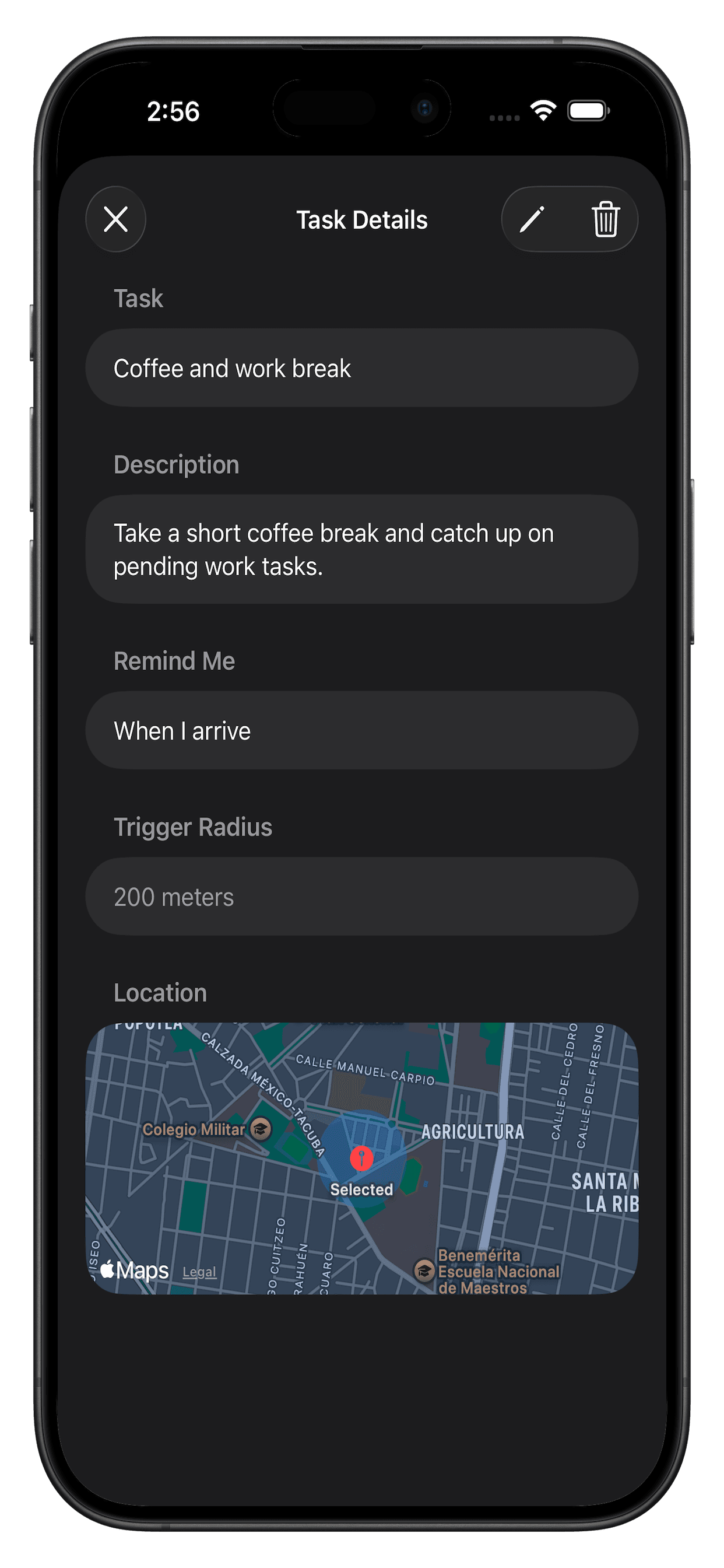 WhileHere Task Details screen showing reminder settings, trigger radius, and the saved location on a map